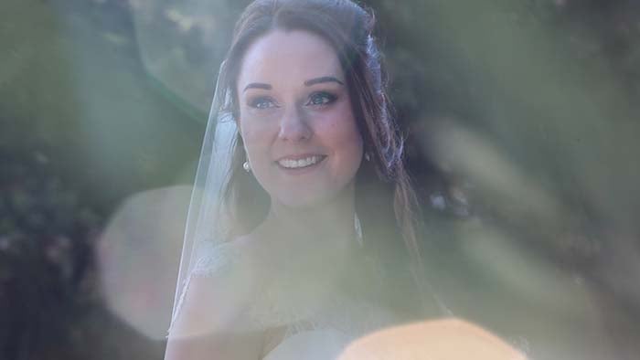 The beautiful smile of the bride Paula. Wedding in Tuscany Terre di Nano wedding video Monticchiello