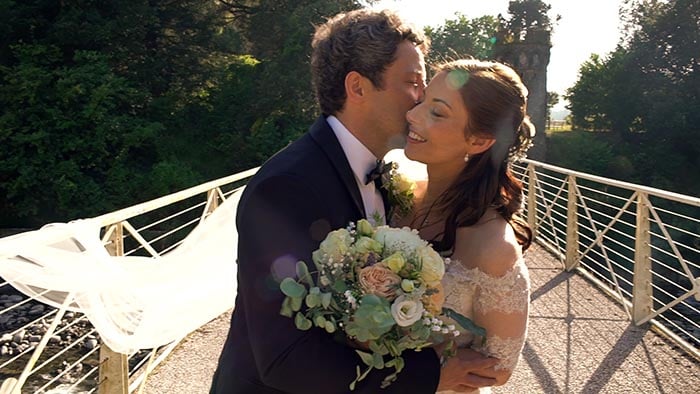 Another frame from "Agriturismo i Cedri wedding video": Passerella sul Lima. Agriturismo I Cedri wedding video in the Lucca countryside, Tuscany, Italy