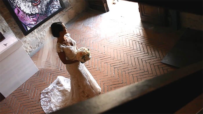 The bride Gina waiting her father before to walking the aisle Tuscany wedding videographer: Gina waiting her father before to walking the aisle