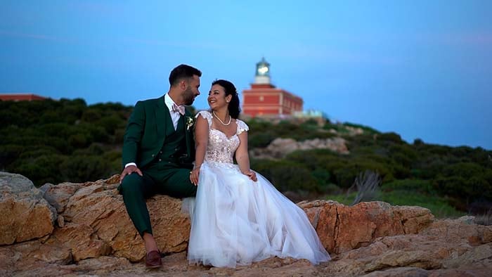 Faro Capo Spartivento wedding in Sardinia, Italy. the couple taken during the walk near the Capo Spartivento lighthouse just before sunset on the beautiful Sardinian sea. Chia, Cagliari, Sardegna, Italia.